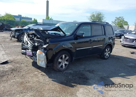 2014 Honda Pilot Touring z USA, uszkodzony, nr VIN 5FNYF4H93EB032767